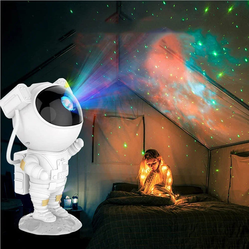 Lâmpada de astronauta projetora de céu estrelado com luz LED colorida, iluminação noturna USB, design moderno e efeito de projeção realista. Ideal para decoração de quarto, ambiente romântico, relaxamento e meditação. Cria um céu estrelado mágico com diferentes cores e modos de luz.